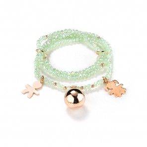 Bracciale in cristallo verde con charms dorati